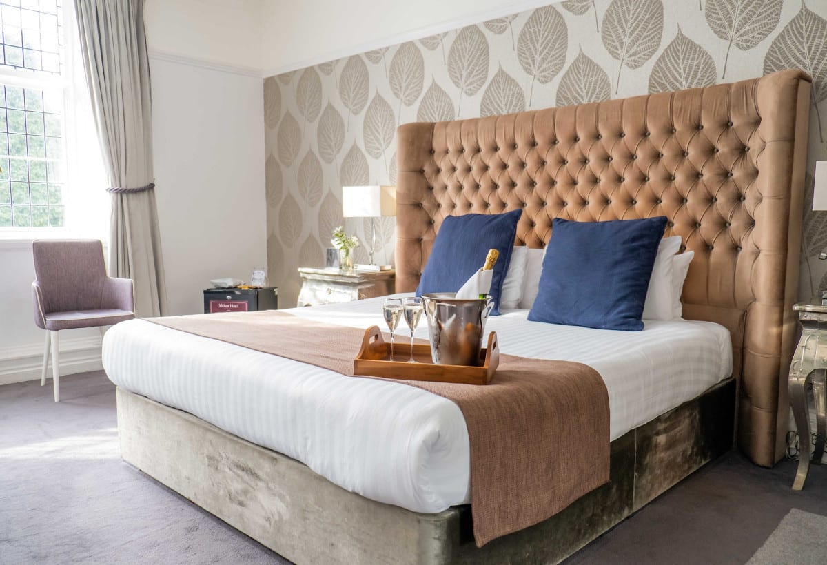 Bedroom with champagne and glasses