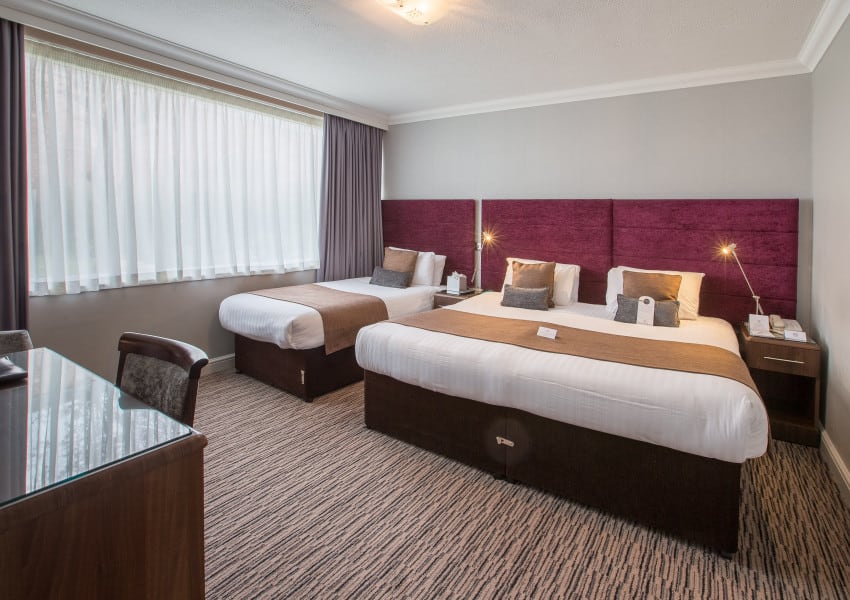 Double bed and single bed in room